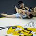 Pioneer Jacob Lee and Skyline Eli Kline wrestle in the 119-pound weight class on Wednesday, Feb. 6. Daniel Brenner I AnnArbor.com